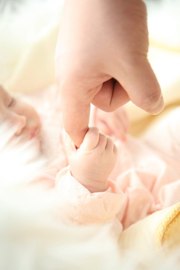 baby-hand-dad-64242-64242 baby-hand-dad-64242-64242.jpg